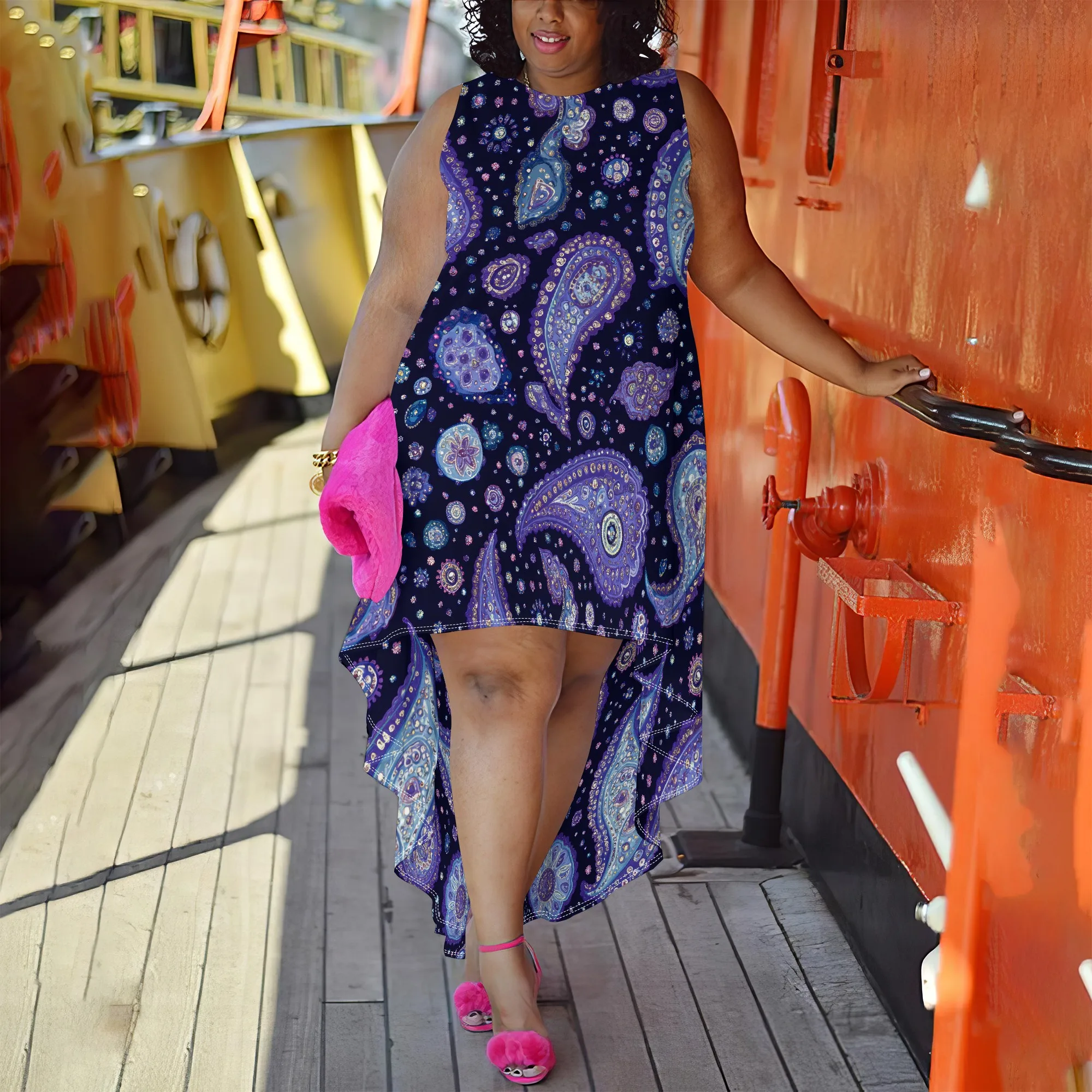 Elegant plus size high-low dress featuring a stylish paisley pattern in deep purples and blues, perfect for any occasion